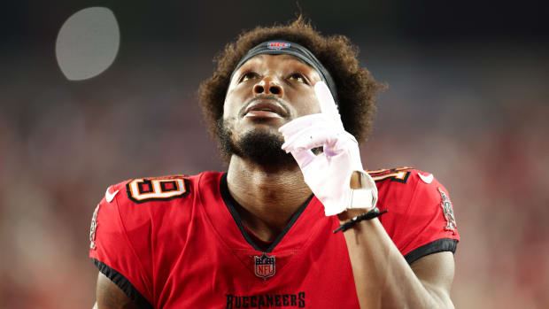 Jan 15, 2024; Tampa, Florida, USA; Tampa Bay Buccaneers wide receiver David Moore (19) gestures in the end zone before a 2024 NFC wild card game against the Philadelphia Eagles at Raymond James Stadium. Mandatory Credit: Nathan Ray Seebeck-USA TODAY Sports