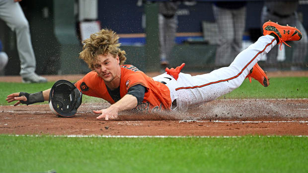 Orioles' Gunnar Henderson slides into home during ALDS Game 2 vs. the Rangers.