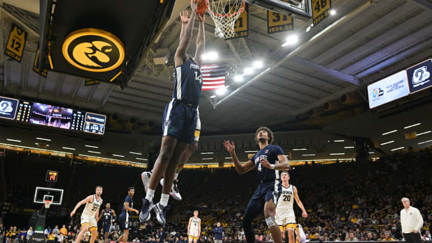 Penn State's Demetrius Lilley goes to the basket in a Big Ten basketball game against the Iowa Hawkeyes.