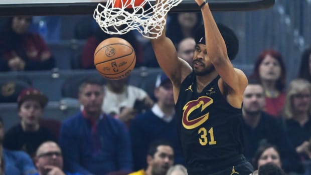 Mar 20, 2024; Cleveland, Ohio, USA; Cleveland Cavaliers center Jarrett Allen (31) dunks in the first quarter against the Miami Heat at Rocket Mortgage FieldHouse.