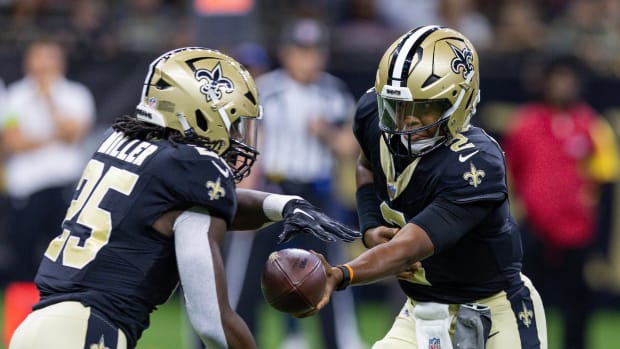 Aug 27, 2023; New Orleans, Louisiana, USA; New Orleans Saints quarterback Jameis Winston (2) hands the ball off to running back Kendre Miller (25) against the Houston Texans during the first half at the Caesars Superdome. Mandatory Credit: Stephen Lew-USA TODAY Sports