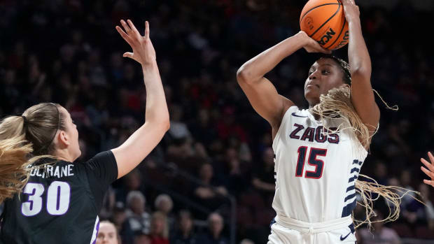 Gonzaga Bulldogs forward Yvonne Ejim (15) shoots the basketball against Portland Pilots forward Lucy Cochrane (30) during the second half in the finals of the WCC Basketball Championship at Orleans Arena on March 12, 2024.