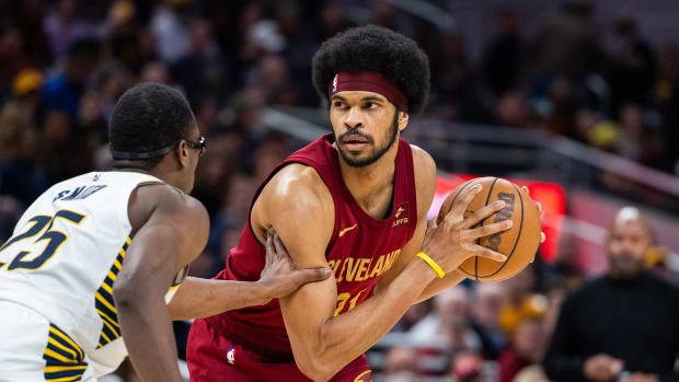 Mar 18, 2024; Indianapolis, Indiana, USA; Cleveland Cavaliers center Jarrett Allen (31) the ball while Indiana Pacers forward Jalen Smith (25) defends in the second half at Gainbridge Fieldhouse.