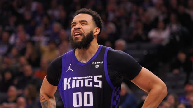 Feb 9, 2024; Sacramento, California, USA; Sacramento Kings center JaVale McGee (00) reacts to comments from the Denver Nuggets bench during the first quarter at Golden 1 Center. Mandatory Credit: Kelley L Cox-USA TODAY Sports