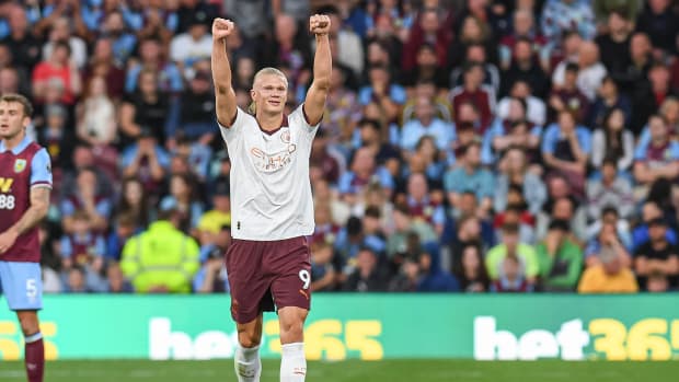 Erling Haaland pictured celebrating after scoring a goal for Manchester City against Burnley in the first game of the 2023/24 Premier League season