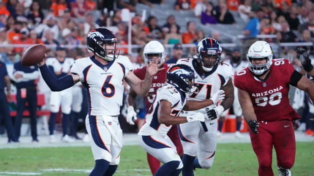 Denver Broncos quarterback Ben DiNucci (6) passes against the Arizona Cardinals during the second half at State Farm Stadium.