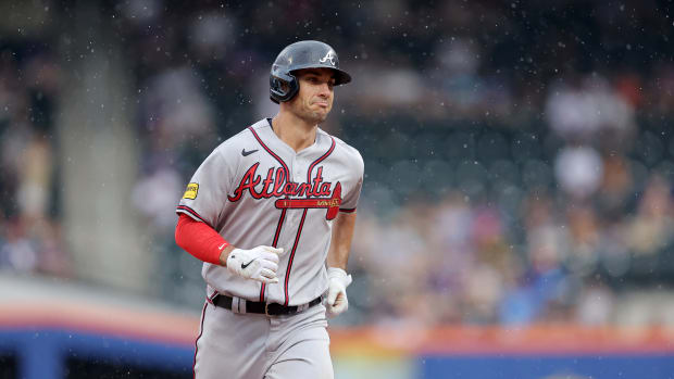 Aug 12, 2023; New York City, New York, USA; Atlanta Braves first baseman Matt Olson (28) rounds the bases after hitting a solo home run against the New York Mets during the eighth inning at Citi Field.