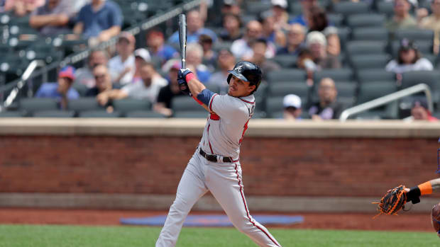 Aug 12, 2023; New York City, New York, USA; Atlanta Braves shortstop Nicky Lopez (15) follows through on an RBI double against the New York Mets during the second inning at Citi Field.