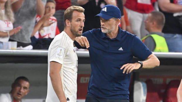 Bayern Munich manager Thomas Tuchel pictured (right) speaking to Harry Kane ahead of the striker's debut for the German club in August 2023