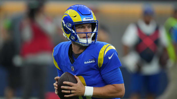 Aug 12, 2023; Inglewood, California, USA; Los Angeles Rams quarterback Brett Rypien (11) throws the ball in the first half against the Los Angeles Chargers at SoFi Stadium. Mandatory Credit: Kirby Lee-USA TODAY Sports
