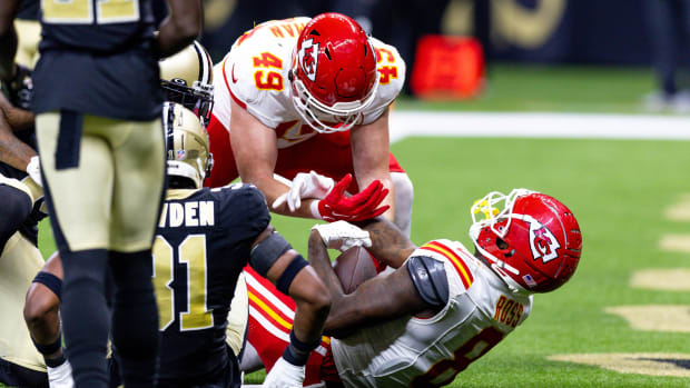 Aug 13, 2023; New Orleans, Louisiana, USA; Kansas City Chiefs wide receiver Justyn Ross (8) scores a touchdown against New Orleans Saints safety Jordan Howden (31) during the second half at the Caesars Superdome. Mandatory Credit: Stephen Lew-USA TODAY Sports  