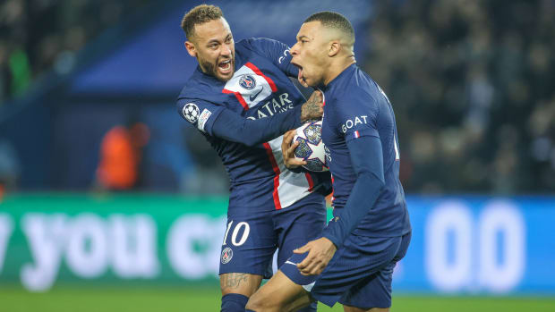 Neymar celebrating with Kylian Mbappé