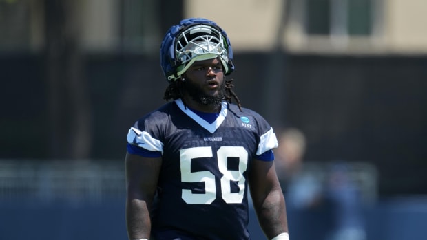 Jul 29, 2023; Oxnard, CA, USA; Dallas Cowboys defensive tackle Mazi Smith (58) wears a Guardian helmet cap during training camp at the River Ridge Fields. Mandatory Credit: Kirby Lee-USA TODAY Sports
