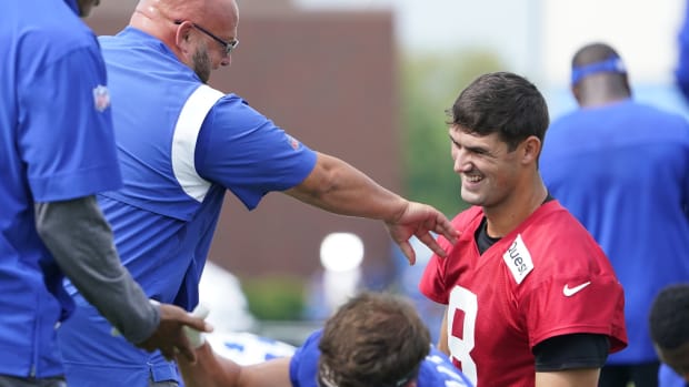 Jul 27, 2023; East Rutherford, NJ, USA; New York Giants head coach Brian Daboll and quarterback Daniel Jones (8) talk during stretches on day two of training camp at the Quest Diagnostics Training Facility.