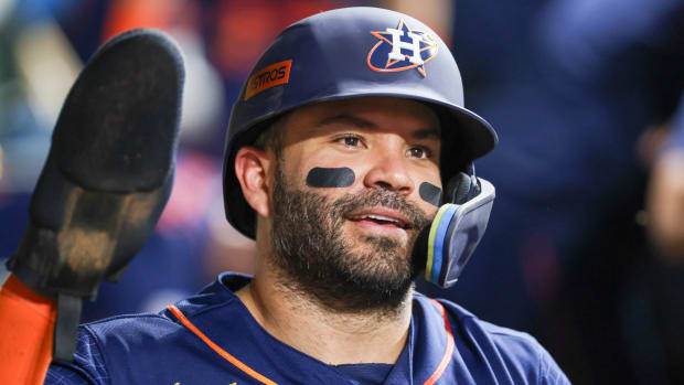 Jul 31, 2023; Houston, Texas, USA; Houston Astros second baseman Jose Altuve (27) celebrates his run after scoring on a Cleveland Guardians wild pitch in the seventh inning at Minute Maid Park. Mandatory Credit: Thomas Shea-USA TODAY Sports  