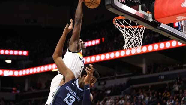 Anthony Edwards of the Timberwolves dunks on Jaren Jackson Jr. of the Grizzlies on Jan. 27, 2023.