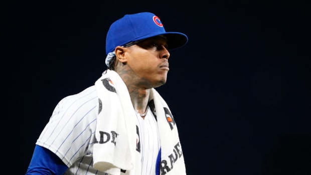 Jul 1, 2023; Chicago, Illinois, USA; Chicago Cubs starting pitcher Marcus Stroman (0) walks onto the field before the game against the Cleveland Guardians at Wrigley Field. Mandatory Credit: David Banks-USA TODAY Sports