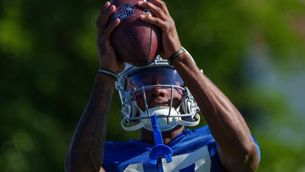 July 31, 2023; Westfield, IN, USA; Indianapolis Colts wide receiver Mike Strachan (17) pulls in a pass Monday, July 31, 2023, during training camp at the Grand Park Sports Campus in Westfield, Indiana.