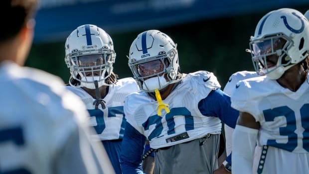 Indianapolis Colts players, including safety Nick Cross (20), center, wait for the next play during day #9 practice of Colts Camp, Tuesday, Aug. 8, 2023 at Grand Park in Westfield.  