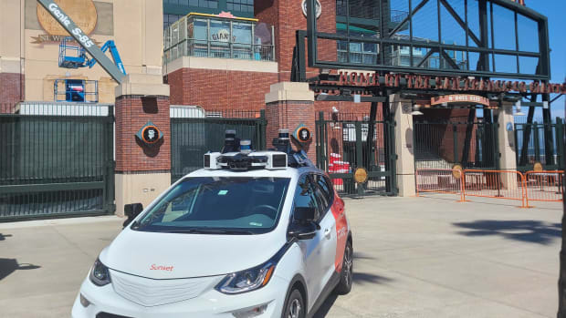 A self-driving Cruise taxi parked in front of Oracle Park. (2023)