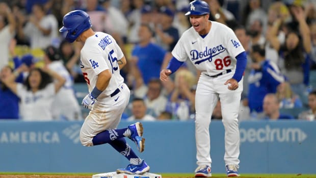 Los Angeles Dodgers catcher Austin Barnes rounds the bases after hitting a solo home run