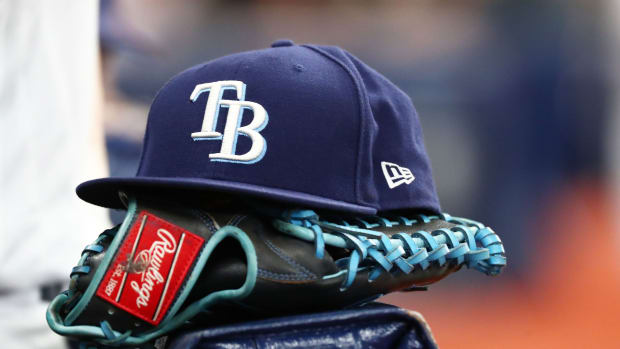 Sep 6, 2019; St. Petersburg, FL, USA; A detail view of a Tampa Bay Rays hat and glove at Tropicana Field.