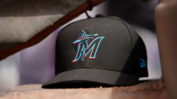 Apr 11, 2019; Cincinnati, OH, USA; A view of a New Era Miami Marlins hat in the dugout during the game against the Cincinnati Reds at Great American Ball Park.