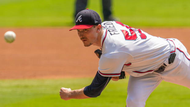 Aug 20, 2023; Cumberland, Georgia, USA; Atlanta Braves starting pitcher Max Fried (54) pitches against the San Francisco Giants during the first inning at Truist Park.