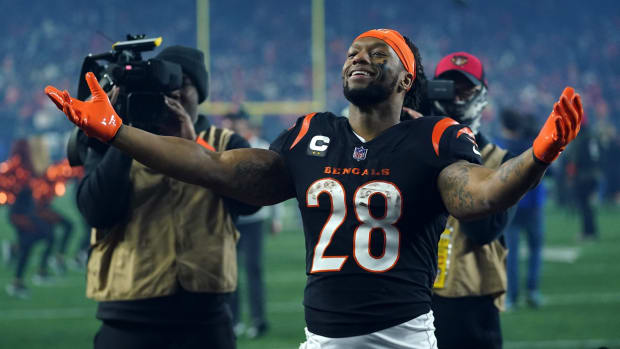 Cincinnati Bengals running back Joe Mixon (28) celebrates the win at the conclusion of an NFL wild-card playoff football game between the Baltimore Ravens and the Cincinnati Bengals, Sunday, Jan. 15, 2023, at Paycor Stadium in Cincinnati. The Cincinnati Bengals won, 24-17. The Cincinnati Bengals advance with the win to play the Buffalo Bills in the divisional round. Baltimore Ravens At Cincinnati Bengals Afc Wild Card Jan 15 0589 Syndication The Enquirer  