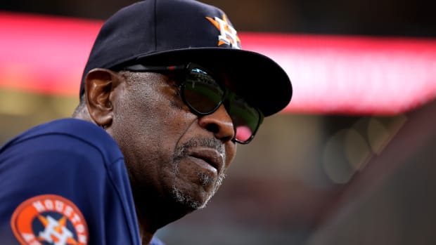 Aug 13, 2023; Houston, Texas, USA; Houston Astros manager Dusty Baker Jr. (12) watches the action from the dugout against the Los Angeles Angels during the second inning at Minute Maid Park. Mandatory Credit: Erik Williams-USA TODAY Sports