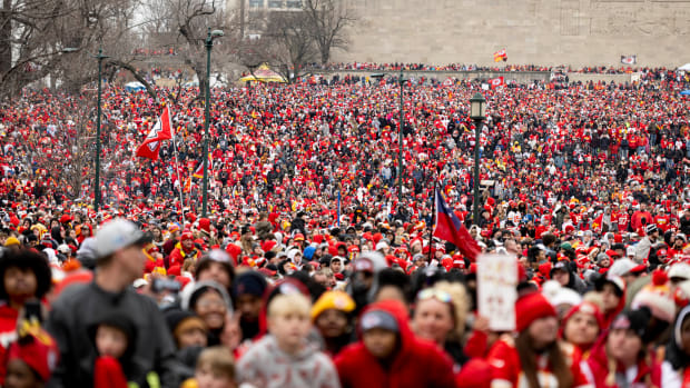 Kansas City Chiefs fan gather at the Super Bowl LVII Champions Parade.