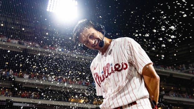 Aug 22, 2023; Philadelphia, Pennsylvania, USA; Philadelphia Phillies shortstop Trea Turner (7) has water dumped on him in celebration of his two RBI walk off single against the San Francisco Giants during the ninth inning at Citizens Bank Park. Mandatory Credit: Bill Streicher-USA TODAY Sports