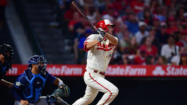 Aug 18, 2023; Anaheim, California, USA; Los Angeles Angels first baseman Nolan Schanuel (18) hits a single against the Tampa Bay Rays during the seventh inning at Angel Stadium.