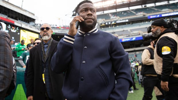 Nov 21, 2021; Philadelphia, Pennsylvania, USA; Entertainer Kevin Hart looks on before a game between the Philadelphia Eagles and the New Orleans Saints at Lincoln Financial Field. Mandatory Credit: Bill Streicher-USA TODAY Sports  
