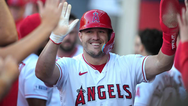 Jun 28, 2023; Anaheim, California, USA; Los Angeles Angels center fielder Mike Trout (27) celebrates after scoring in the first inning against the Chicago White Sox at Angel Stadium.