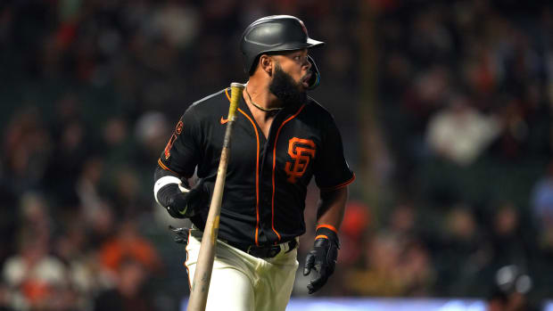 SF Giants right fielder Heliot Ramos flips his bat after hitting a home run against the Texas Rangers during the ninth inning at Oracle Park. (2023)
