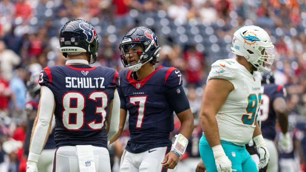 Aug 19, 2023; Houston, Texas, USA; Houston Texans quarterback C.J. Stroud (7) talks with Houston Texans tight end Dalton Schultz (83) after throwing an incomplete pass and turning over the ball on downs in the first quarter at NRG Stadium. Mandatory Credit: Thomas Shea-USA TODAY Sports