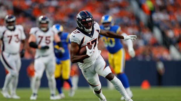 Denver Broncos wide receiver Lil'Jordan Humphrey (17) runs the ball on a reception in the first quarter against the Los Angeles Rams at Empower Field at Mile High.
