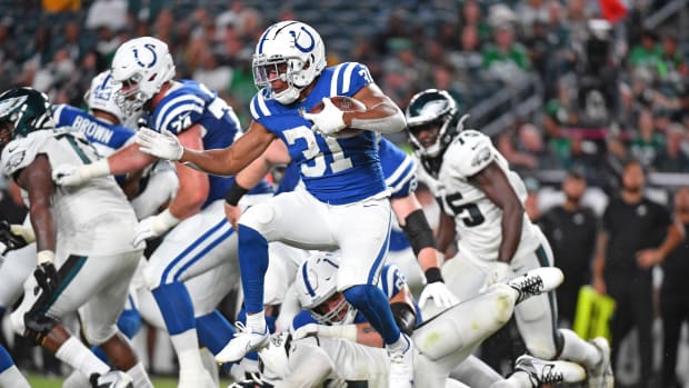 Indianapolis Colts running back Kenyan Drake (31) leaps over Philadelphia Eagles defensive tackle Caleb Sanders (67) during the fourth quarter of a preseason game at Lincoln Financial Field. Drake didn't make the Colts' final roster.