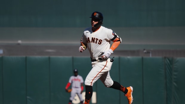 SF Giants third baseman Casey Schmitt rounds the bases on a solo home run against the Atlanta Braves during the second inning at Oracle Park on August 27, 2023.