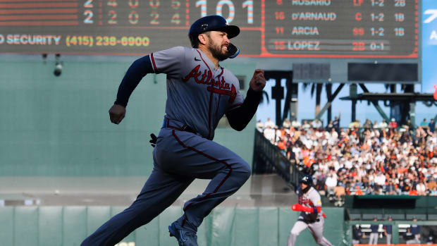 Aug 27, 2023; San Francisco, California, USA; Atlanta Braves catcher Travis d'Arnaud (16) runs home against the San Francisco Giants during the fifth inning at Oracle Park.