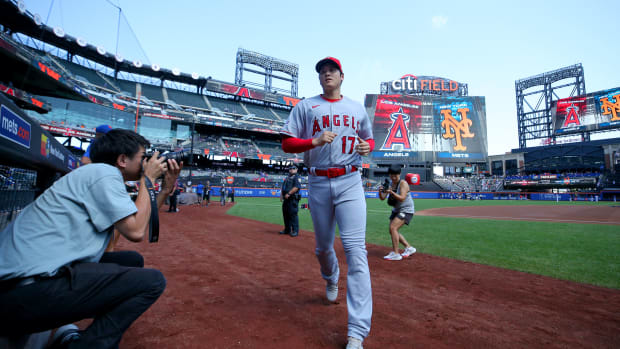 Aug 27, 2023; New York City, New York, USA; Los Angeles Angels designated hitter Shohei Ohtani (17) runs to the dugout after warming up before a game against the New York Mets at Citi Field.