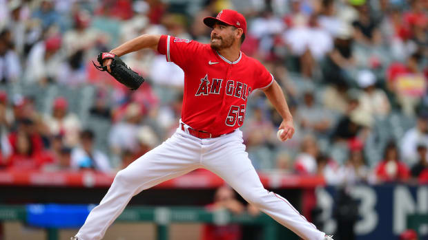 Aug 19, 2023; Anaheim, California, USA; Los Angeles Angels relief pitcher Matt Moore (55) throws against the Tampa Bay Rays during the eighth inning at Angel Stadium.