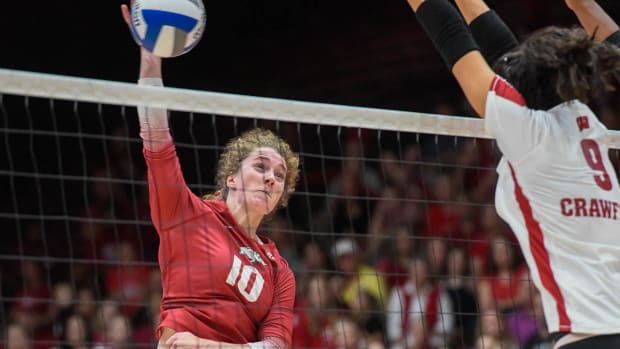 Razorbacks' Jillian Gillen with a spike against Wisconsin at Barnhill Arena