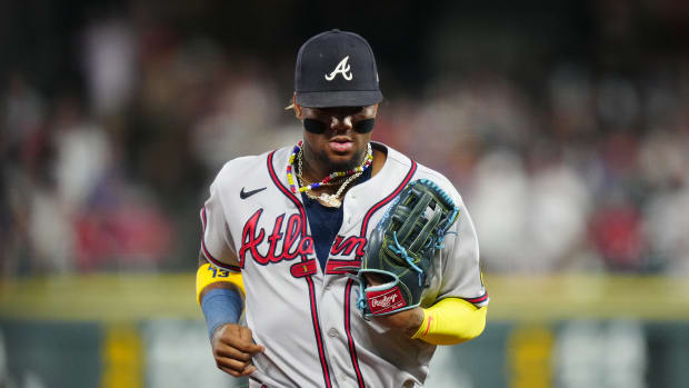 Aug 30, 2023; Denver, Colorado, USA; Atlanta Braves right fielder Ronald Acuna Jr. (13) leaves the field in the fourth inning against the Colorado Rockies at Coors Field.