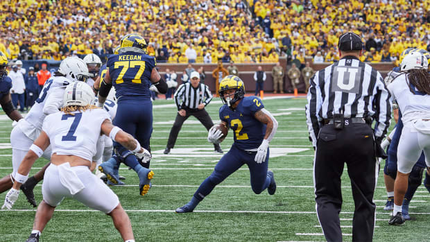 Michigan’s Blake Corum rushes the ball vs. Penn State.