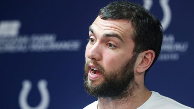 Former Colts quarterback Andrew Luck speaks to media in 2019.