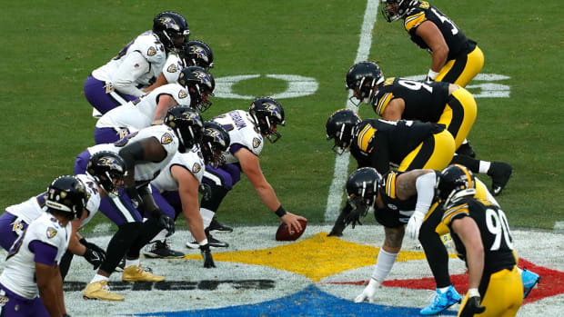 The Ravens prepare to snap the ball against the Steelers