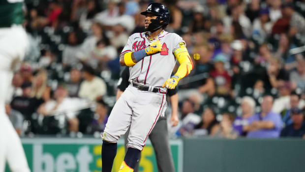 Aug 30, 2023; Denver, Colorado, USA; Atlanta Braves right fielder Ronald Acuna Jr. (13) celebrates his single in the ninth inning against the Colorado Rockies at Coors Field.