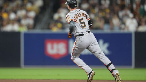 SF Giants right fielder Mike Yastrzemski (5) runs the bases after hitting a home run against the San Diego Padres (2023)